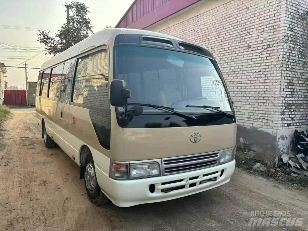 Toyota Coaster Tarpmiestiniai autobusai