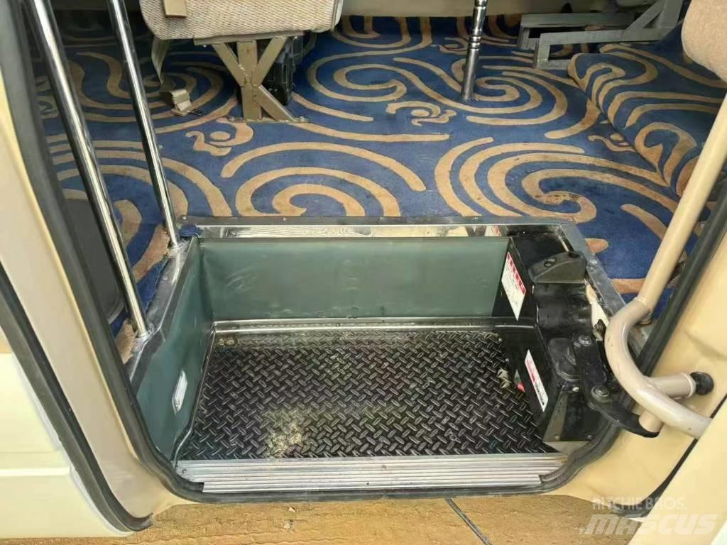 Toyota Coaster Tarpmiestiniai autobusai