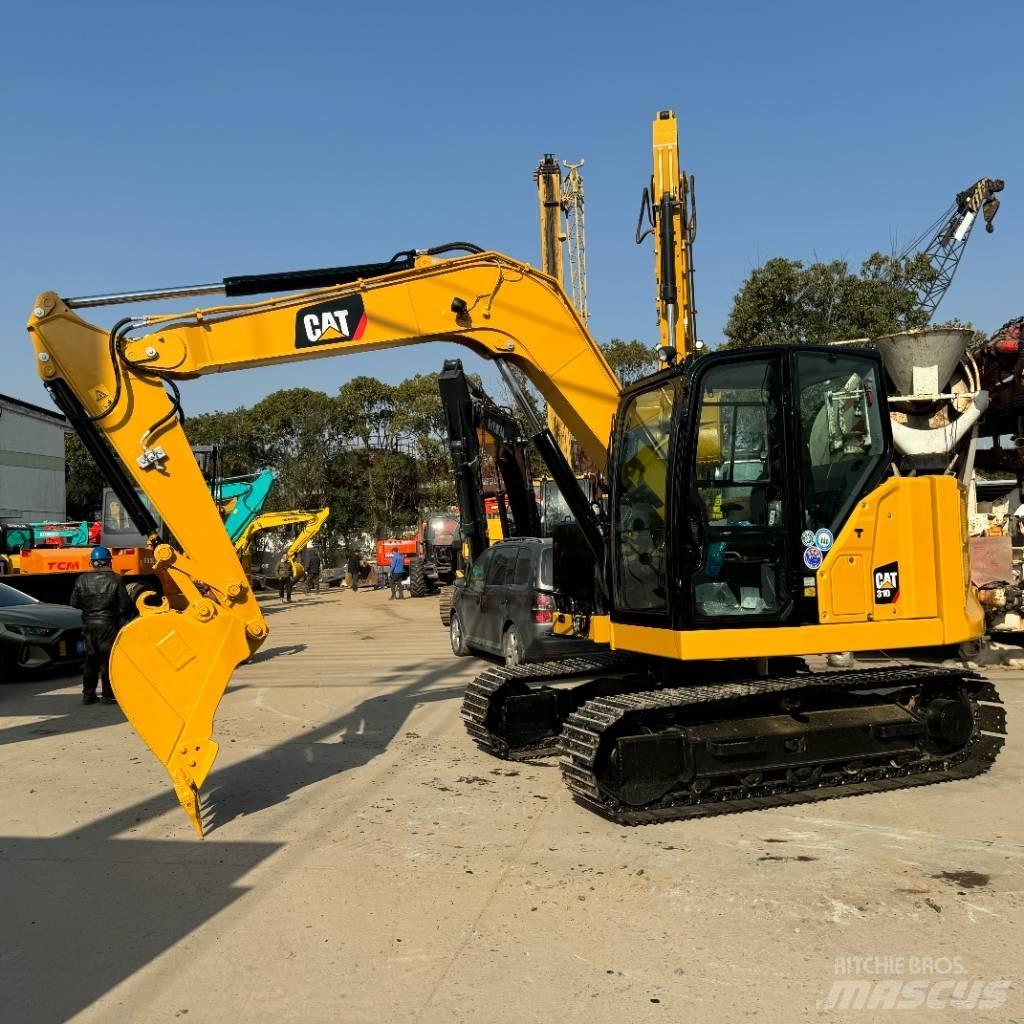 CAT 310 Vikšriniai ekskavatoriai
