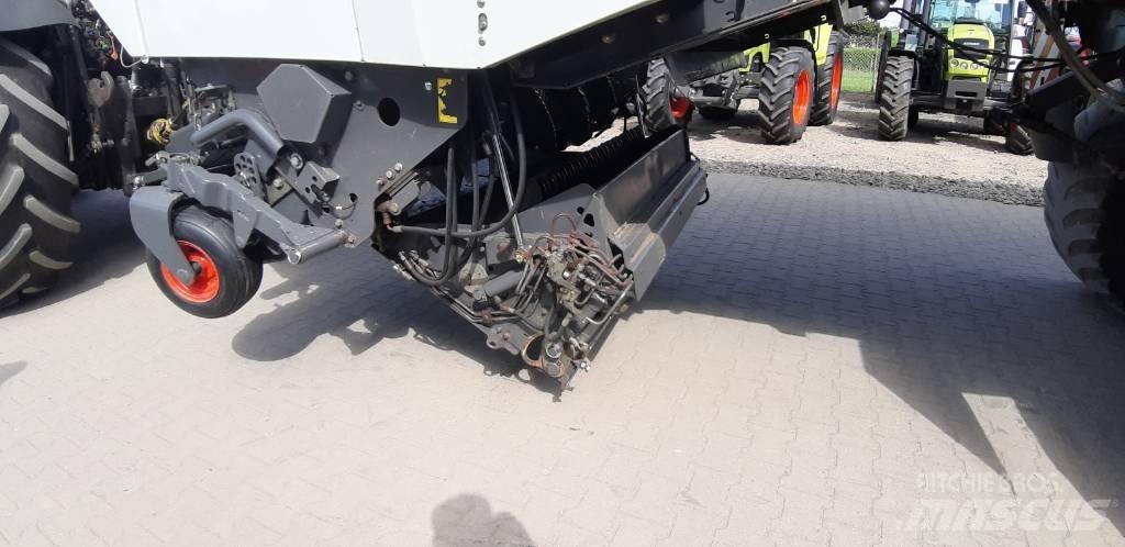 CLAAS Cargos 9500 Savikrovės priekabos