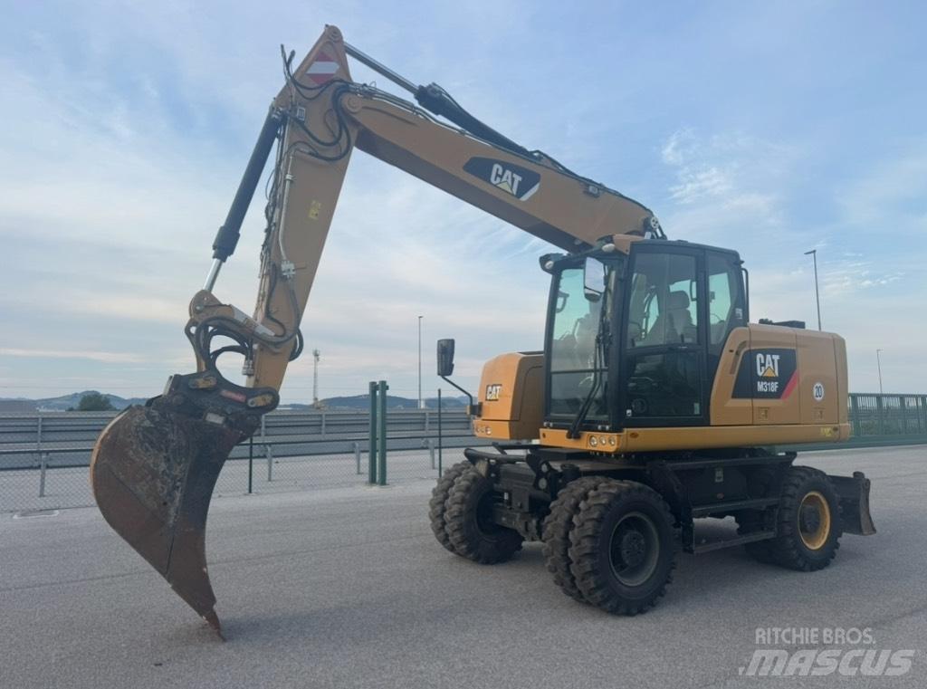 CAT M 318 F Ratiniai ekskavatoriai