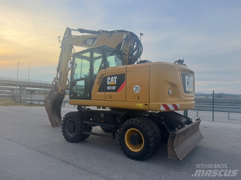 CAT M 318 F Ratiniai ekskavatoriai