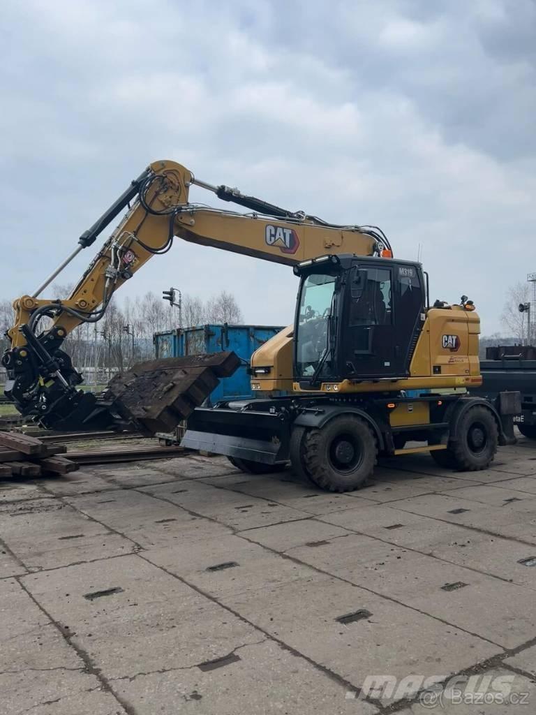 CAT M 319 Ratiniai ekskavatoriai