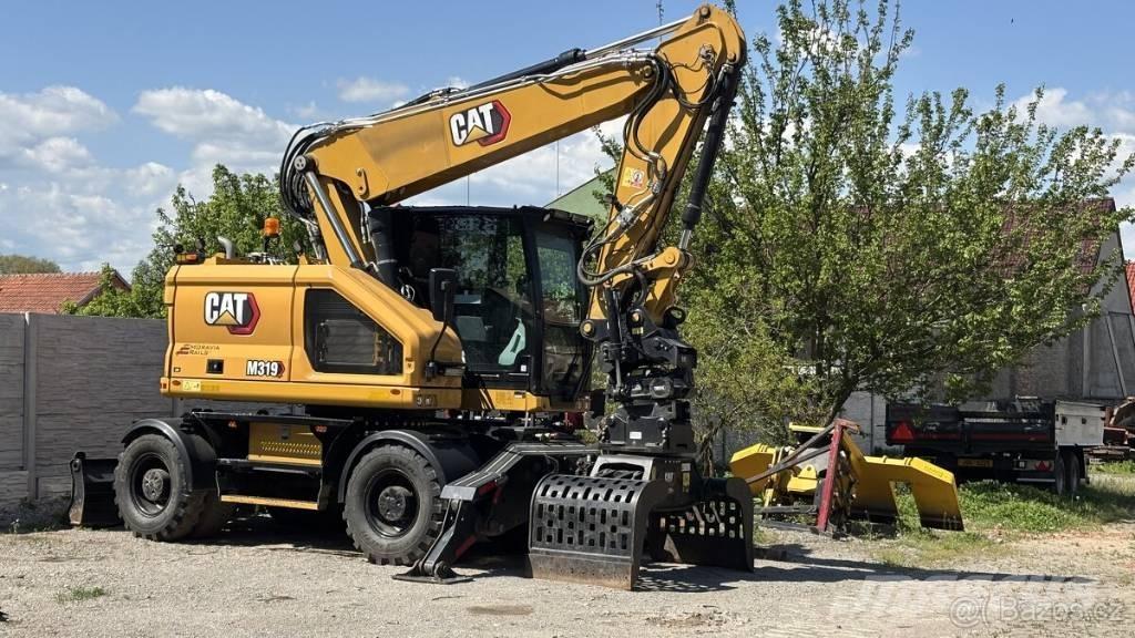 CAT M 319 Ratiniai ekskavatoriai