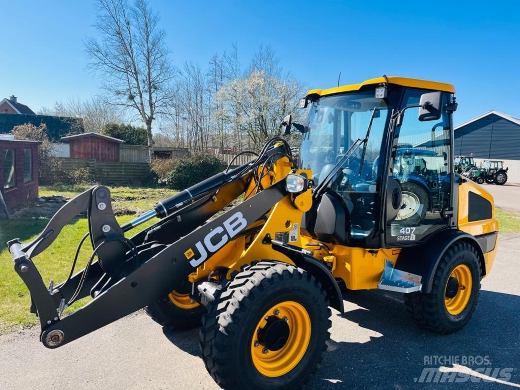 JCB 407 Daugiafunkciniai pakrovėjai