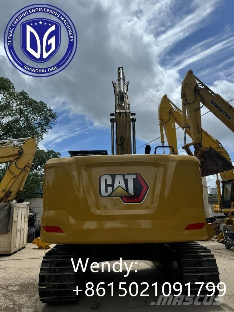 CAT 323 Vikšriniai ekskavatoriai