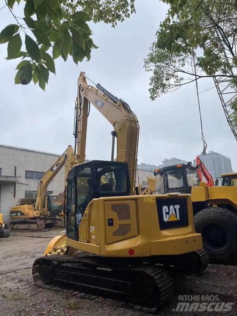 CAT 310 Vikšriniai ekskavatoriai