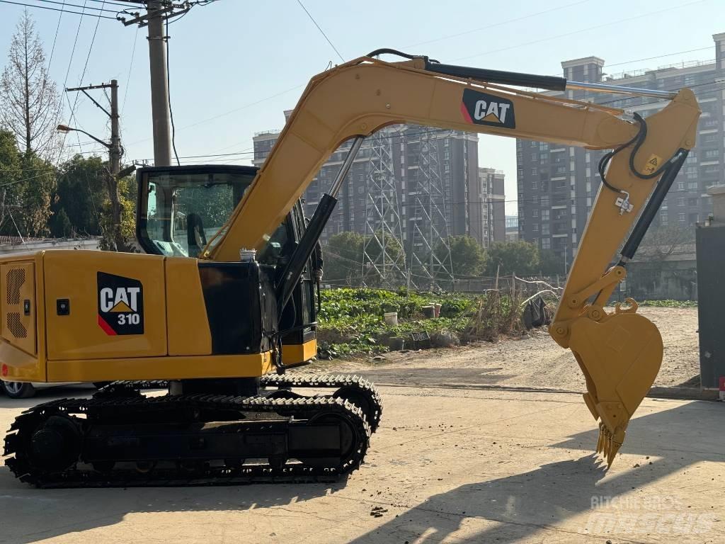CAT 310 Vikšriniai ekskavatoriai