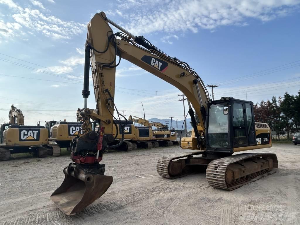 CAT 319 D L Vikšriniai ekskavatoriai