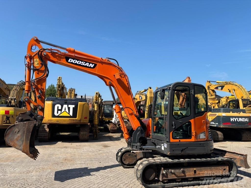 Doosan DX 80 R Vidutinės galios ekskavatoriai 7-12 t