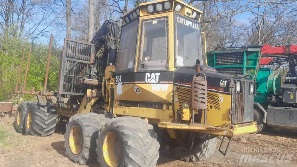 CAT 554 Naudoti miškovežiai (Forvarderiai)
