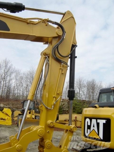 CAT 311F Vikšriniai ekskavatoriai