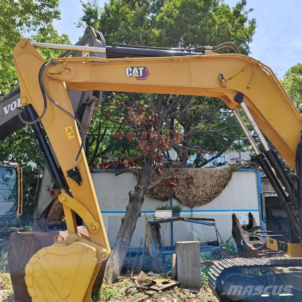 CAT 310 Vikšriniai ekskavatoriai