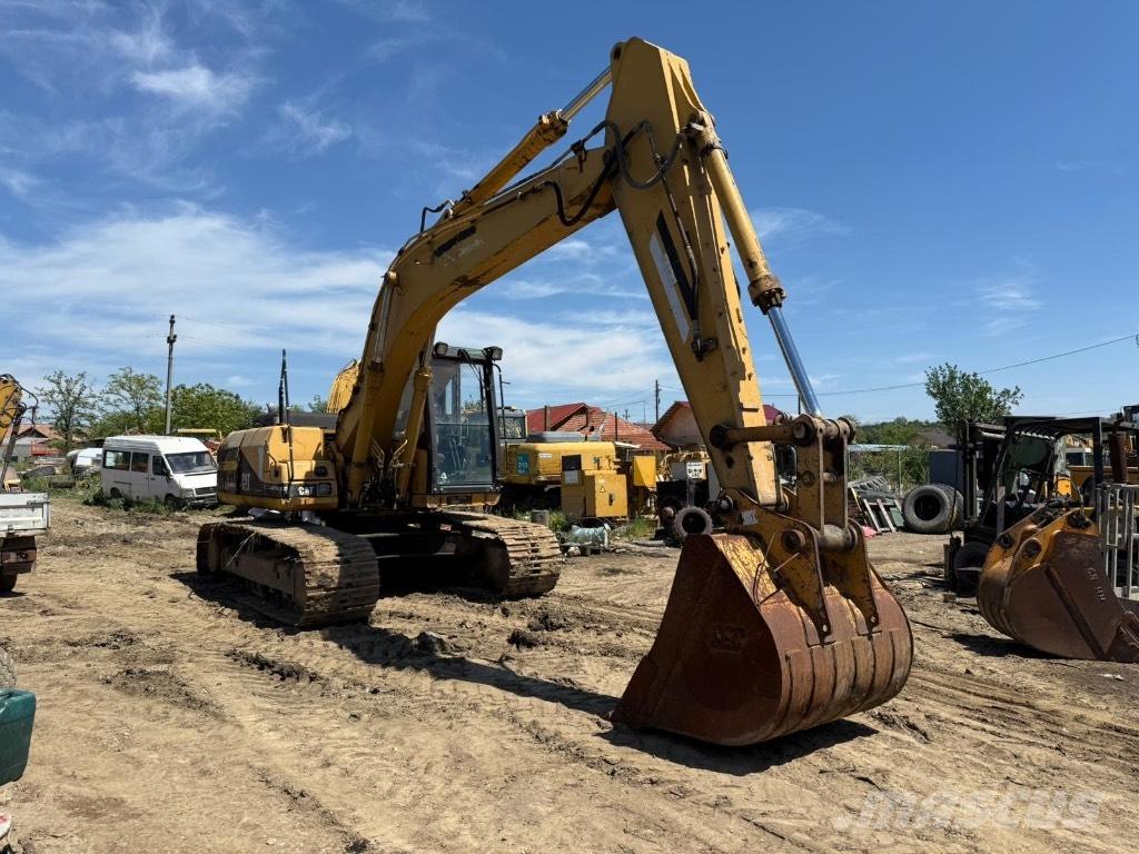 CAT 318 Kabinos ir interjeras