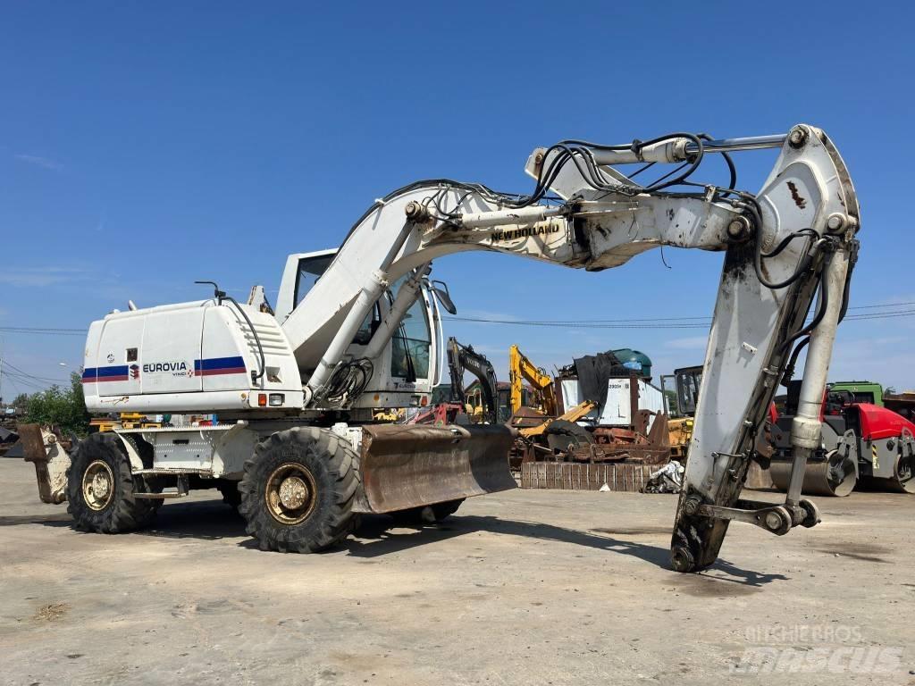 New Holland MH Plus Ratiniai ekskavatoriai