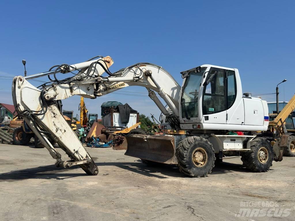 New Holland MH Plus Ratiniai ekskavatoriai