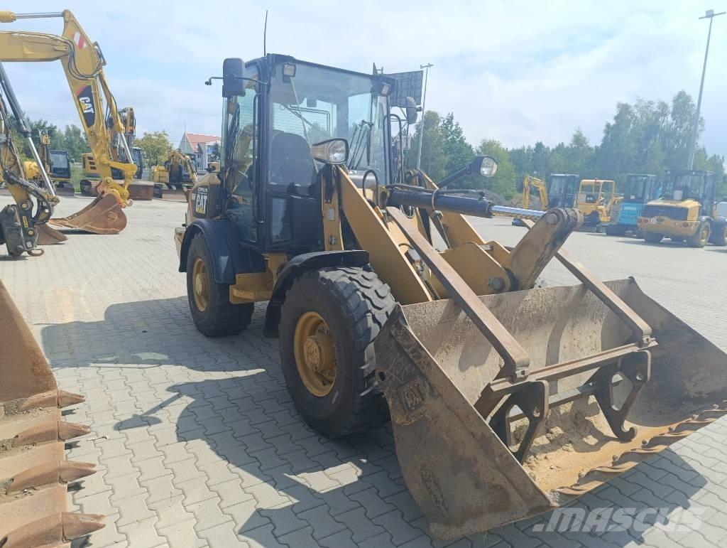 CAT 906 H Naudoti ratiniai krautuvai