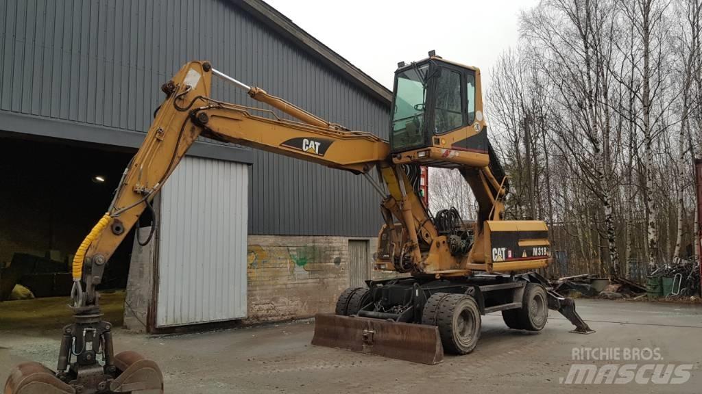 CAT M 318 Atliekų / pramoniniai krautuvai