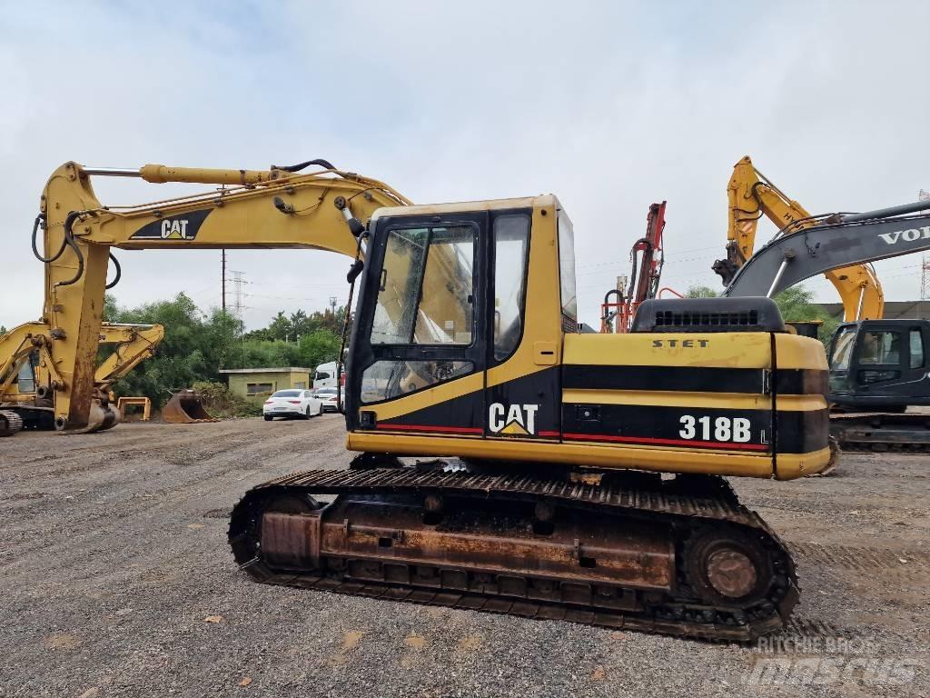 CAT 318 B L Vikšriniai ekskavatoriai