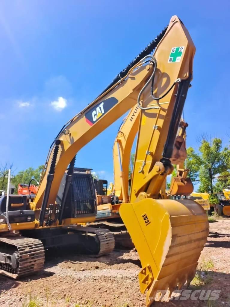 CAT 324 D2L Vikšriniai ekskavatoriai