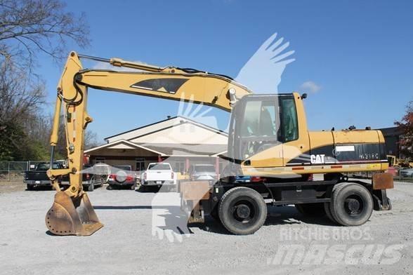 CAT M318C Ratiniai ekskavatoriai