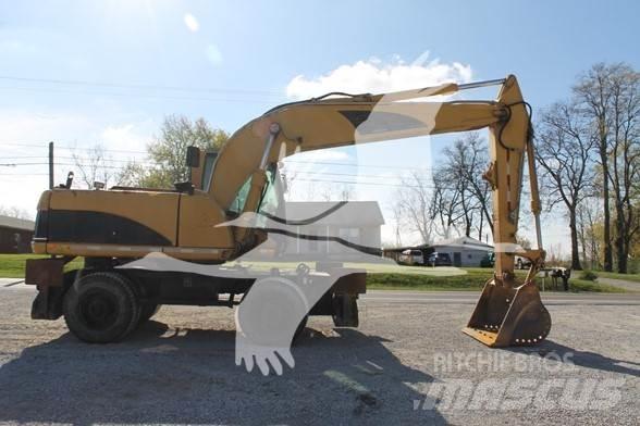 CAT M318C Ratiniai ekskavatoriai
