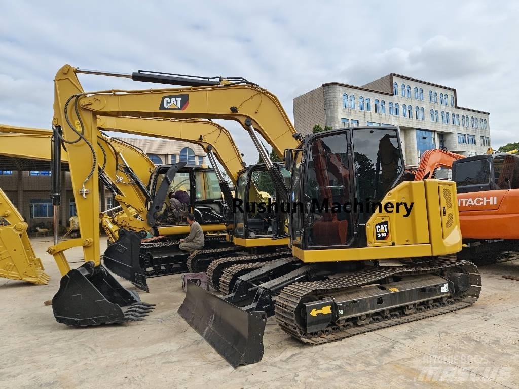 CAT 310 Vikšriniai ekskavatoriai
