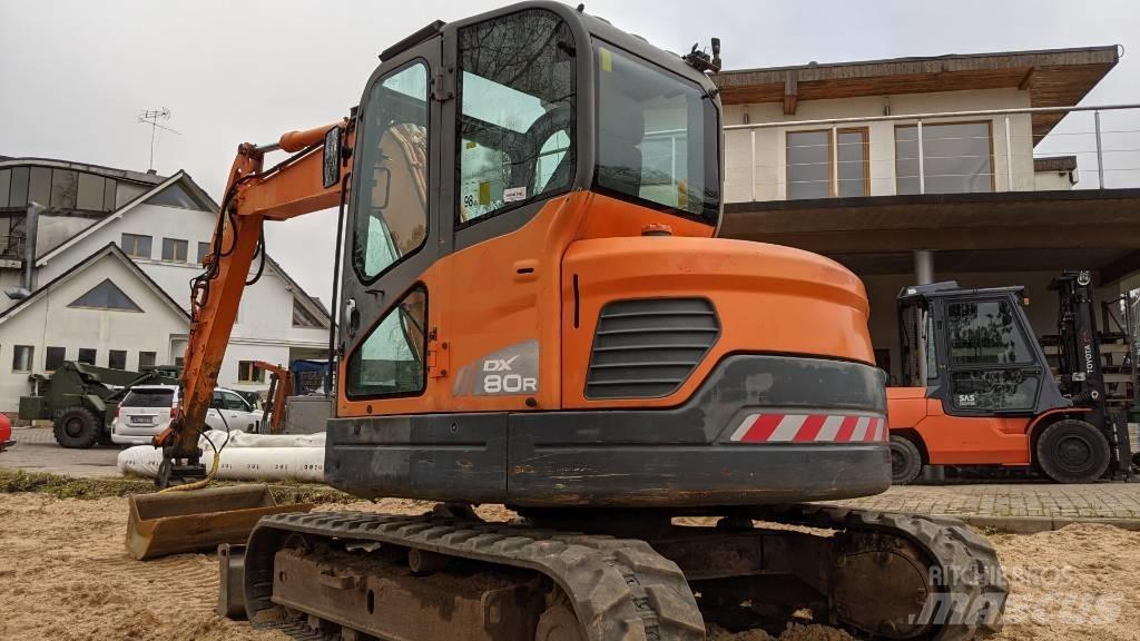 Doosan DX 80 R Vidutinės galios ekskavatoriai 7-12 t