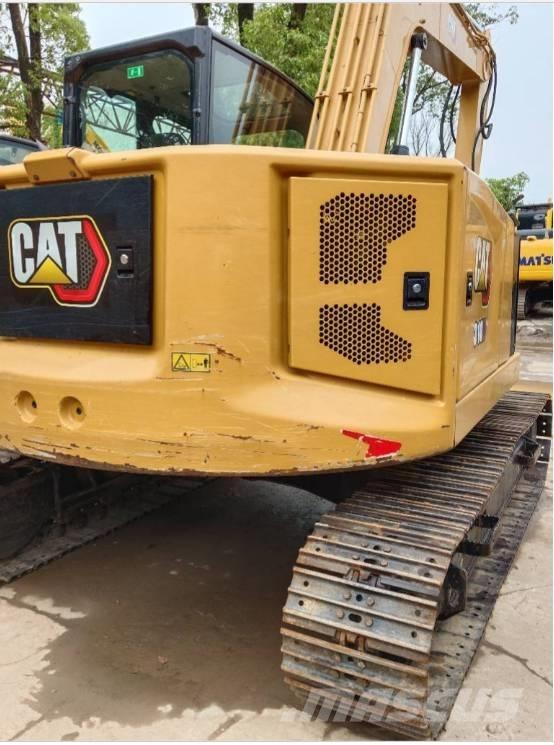CAT 310 Vikšriniai ekskavatoriai