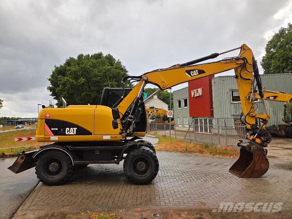 CAT M313D Ratiniai ekskavatoriai