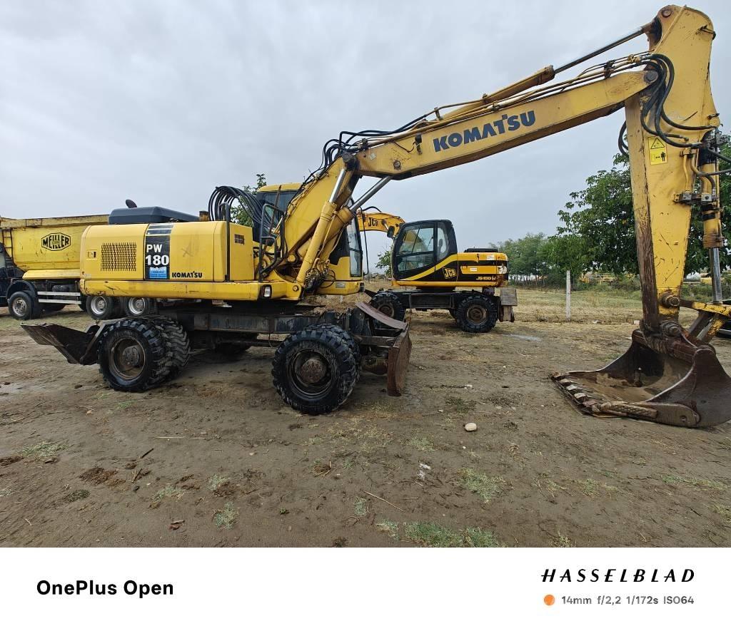 Komatsu PW 180 Važiuoklė ir suspensija