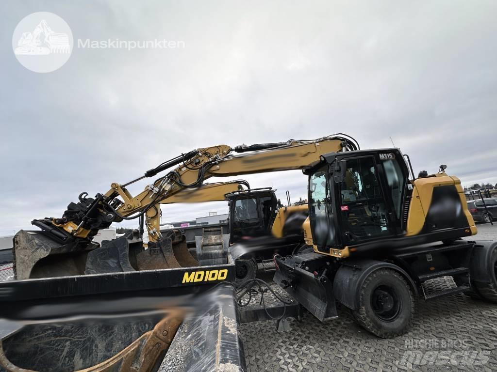 CAT M 315 Ratiniai ekskavatoriai