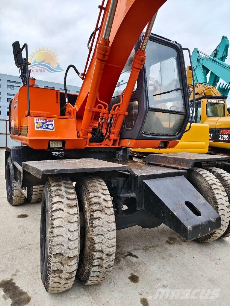 Hitachi EX 100 W D Ratiniai ekskavatoriai