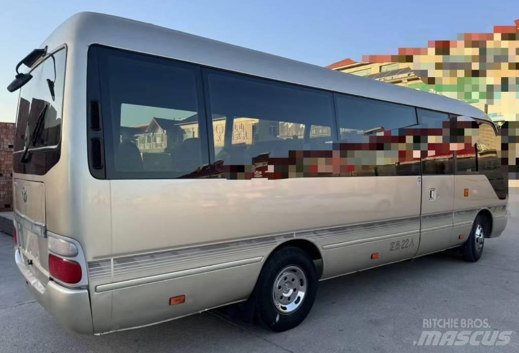 Toyota Coaster Tarpmiestiniai autobusai