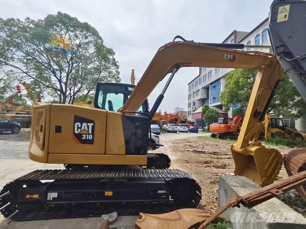 CAT 310 Vikšriniai ekskavatoriai