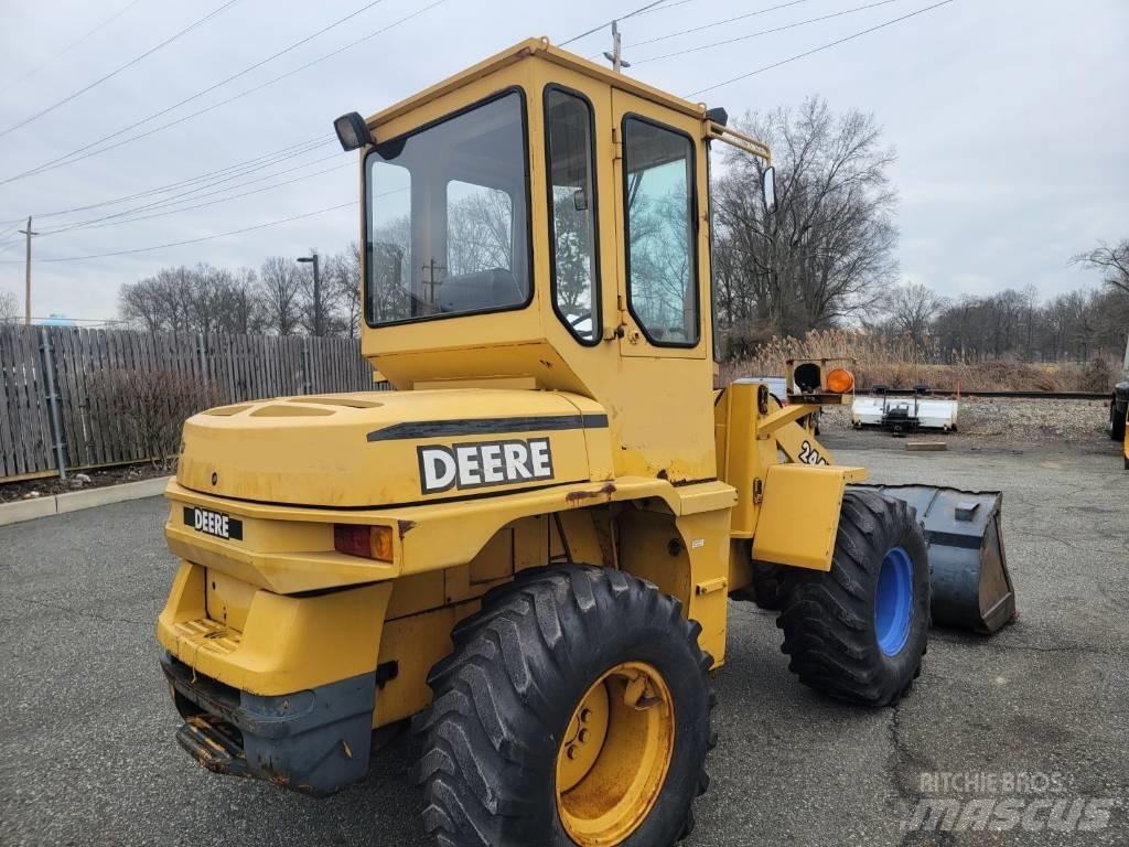 John Deere 244H Naudoti ratiniai krautuvai