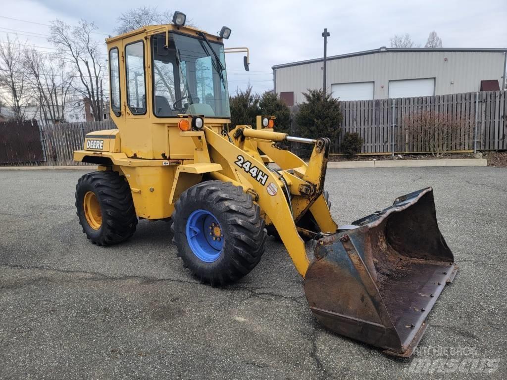 John Deere 244H Naudoti ratiniai krautuvai