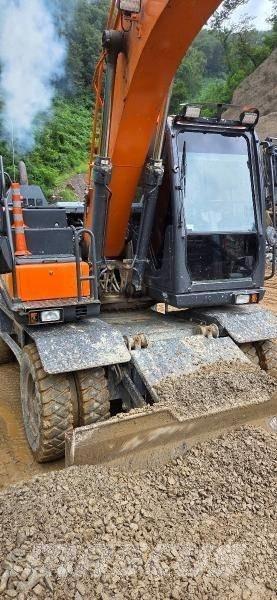 Doosan D 140W-5 Ratiniai ekskavatoriai