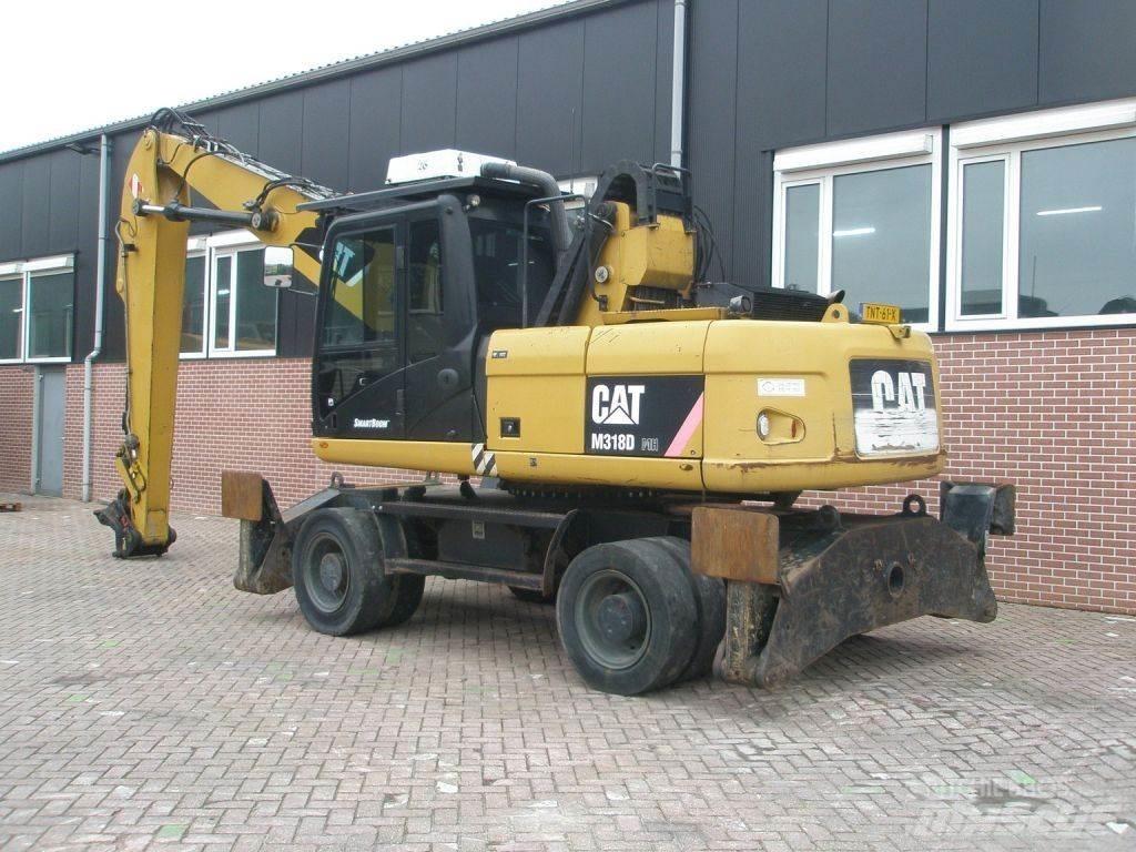 CAT M318D Ratiniai ekskavatoriai