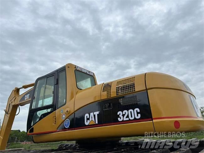 CAT 320 C Amfibiniai ekskavatoriai