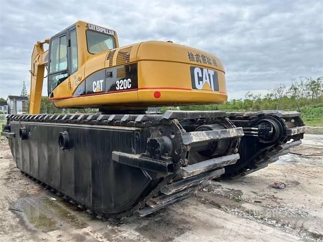 CAT 320 C Amfibiniai ekskavatoriai