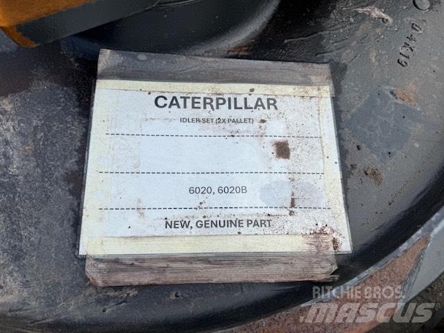 CAT 6020 NEW IDLER Vikšrai, grandinės ir važiuoklės