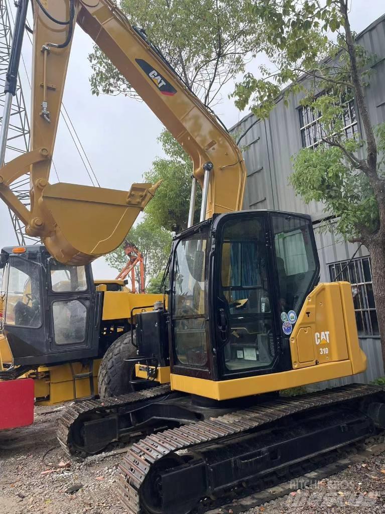 CAT 310 Vikšriniai ekskavatoriai