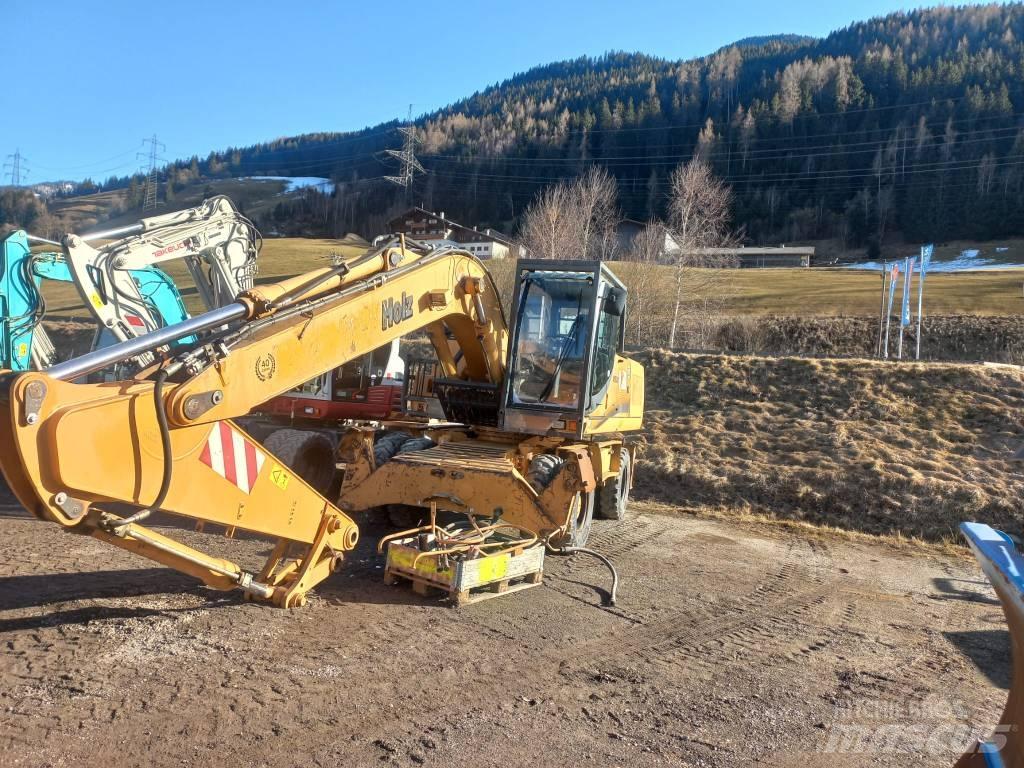 CASE 210WX Ratiniai ekskavatoriai