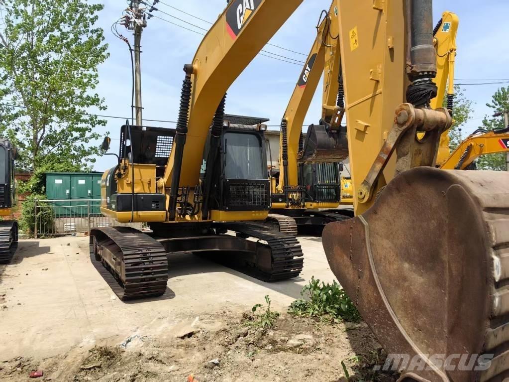 CAT 323 D Vikšriniai ekskavatoriai