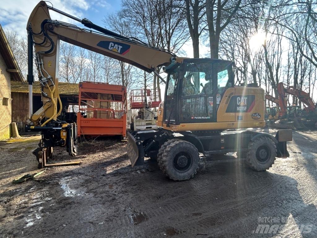 CAT M315 Ratiniai ekskavatoriai