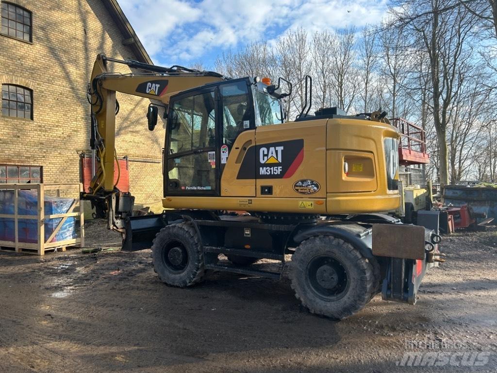 CAT M315 Ratiniai ekskavatoriai