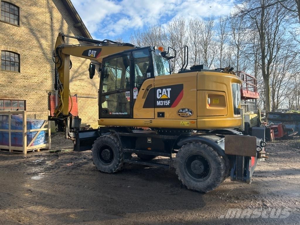 CAT M315F Ratiniai ekskavatoriai