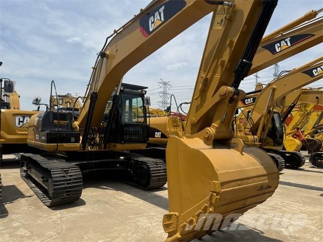 CAT 323 D L Vikšriniai ekskavatoriai