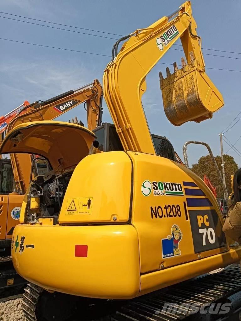 Komatsu PC 70 Vidutinės galios ekskavatoriai 7-12 t